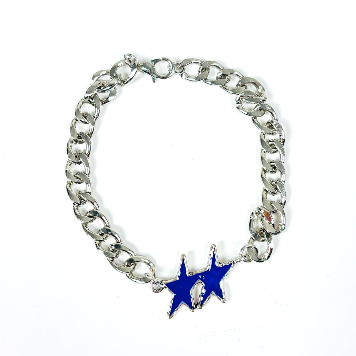 A silver-tone curb chain bracelet featuring a dangling blue star charm with a small white accent, shown on a plain white background.
