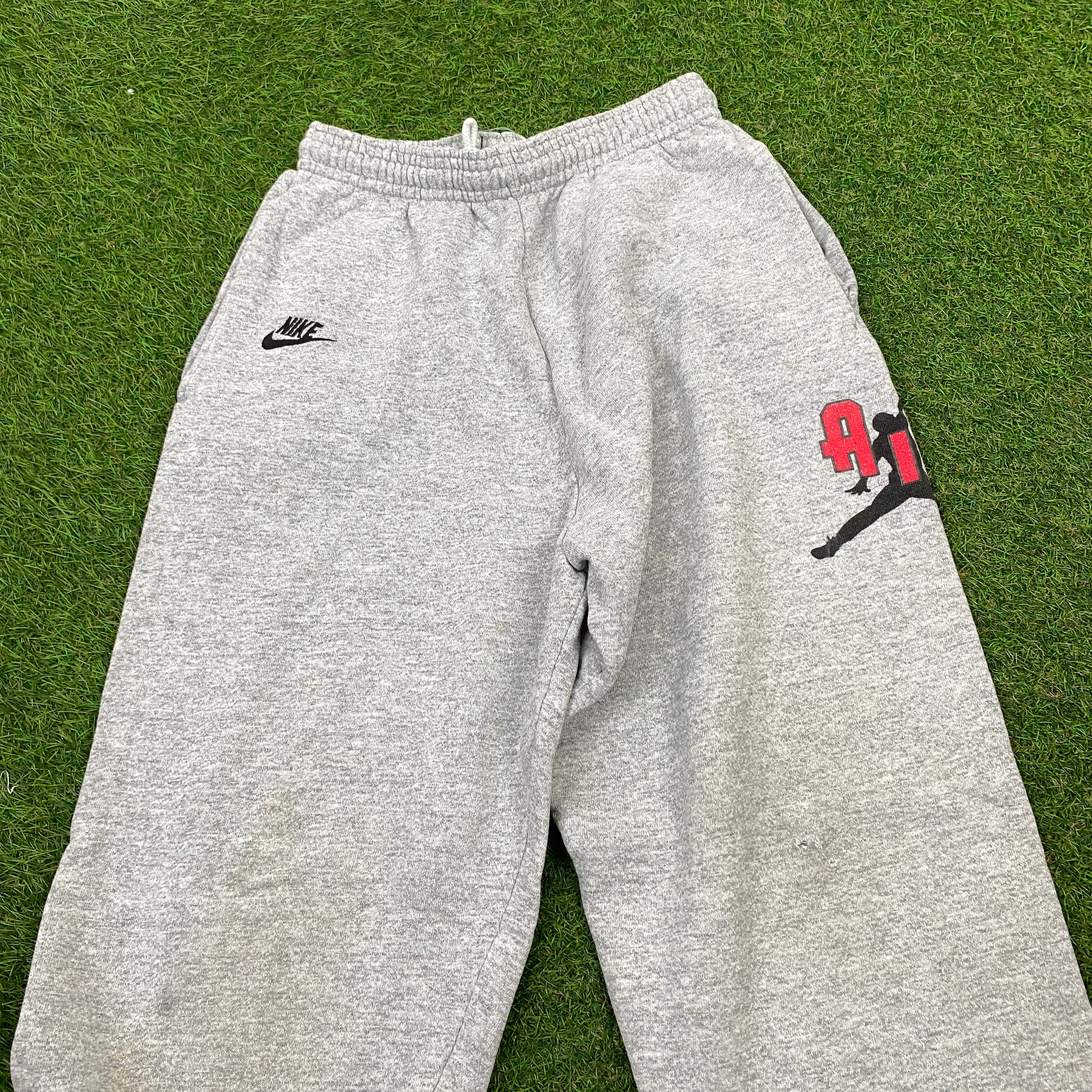 Nike grey best sale sweatpants shorts