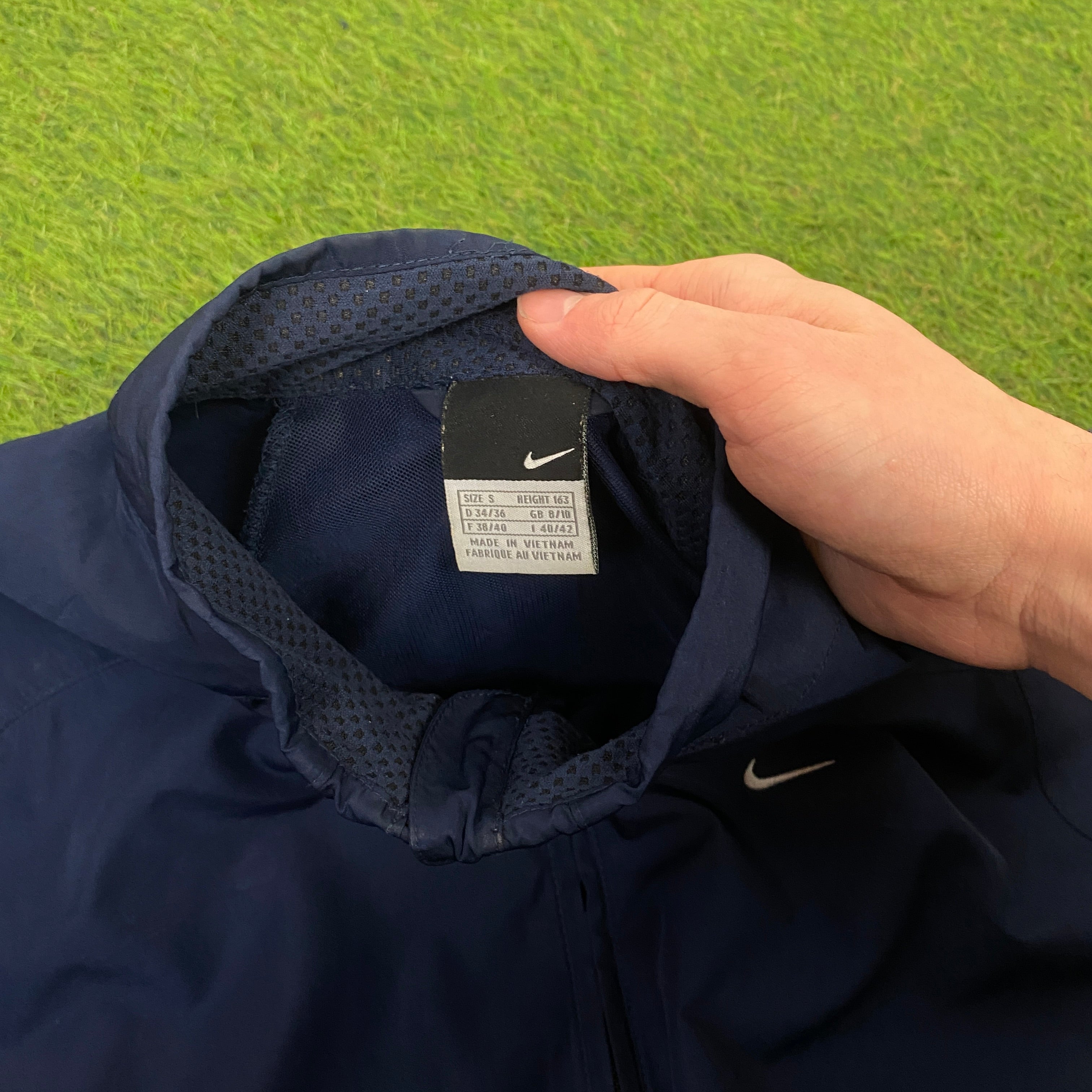 Nike best sale tracksuit small